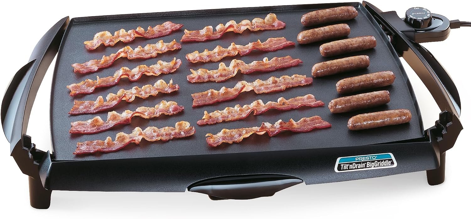 Presto Tilt n Drain electric griddle covered with strips of bacon and sausages